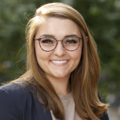 Kat Clark - Head of Customer Experience at Uptok | The Org